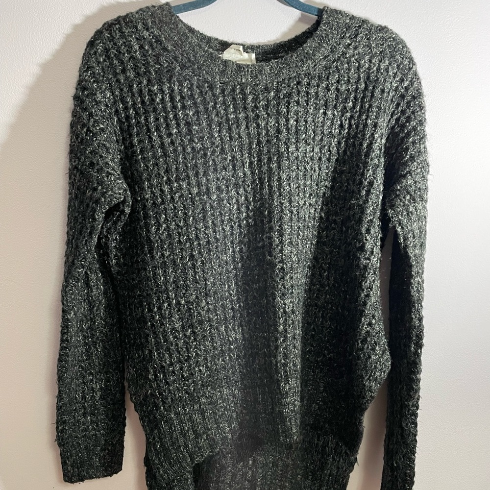 Simple, loosely fitted Sweater. Short in the front, long in the back. BCBG.